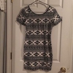 Scoop back tribal print body con dress